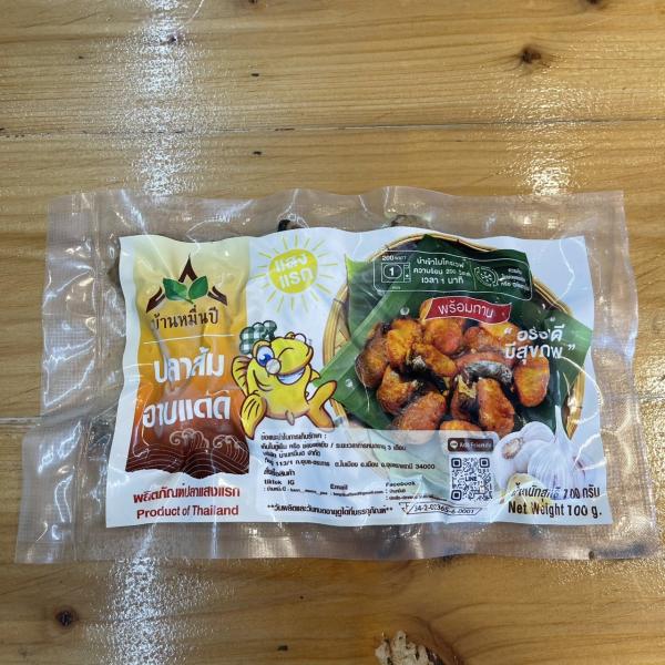 Orange fish basking in the first rays of sunlight